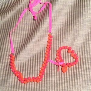 Crewcuts necklace and bracelet set, pink and orange